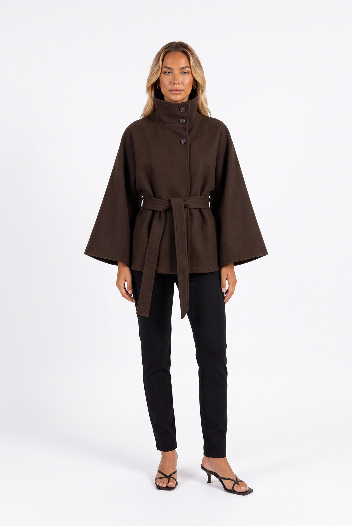 Dark brown belted cape jacket with funnel collar — front